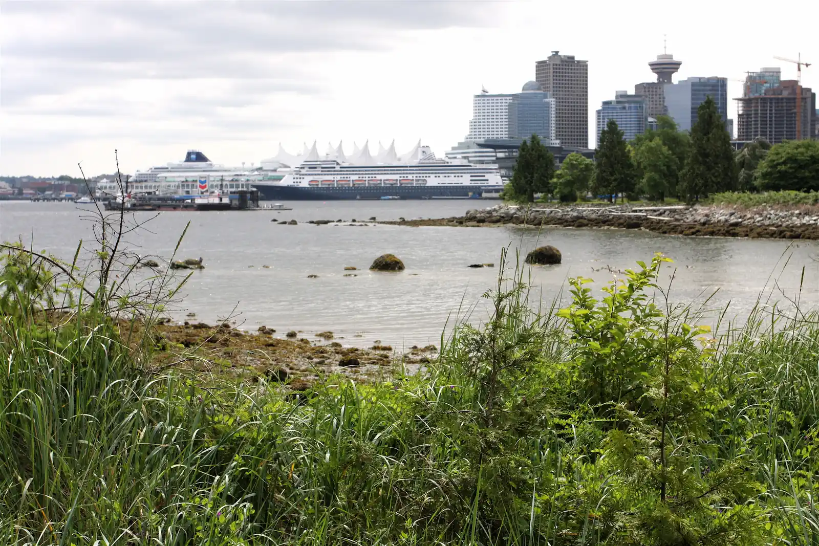 Canada Place cruise terminal and a docked cruise ship on the Vancouver waterfront