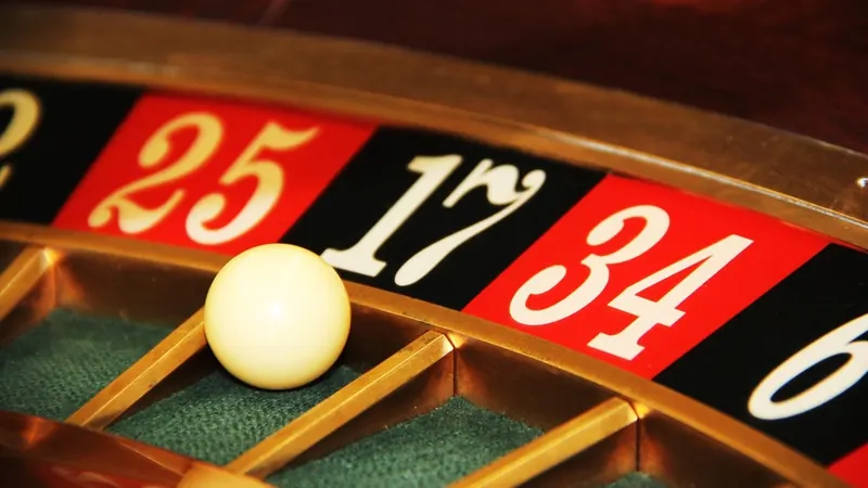 Roulette ball resting in a numbered pocket