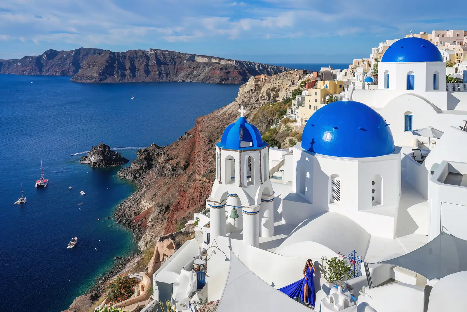 Blue domed churches above the caldera in Oia, Santorini, Greece