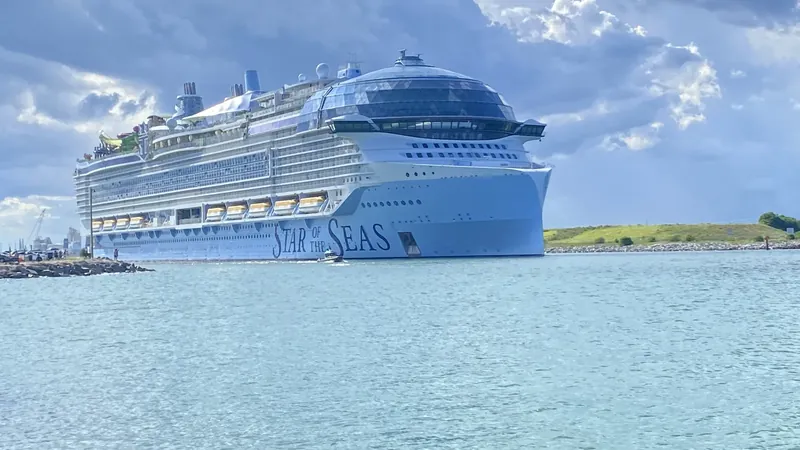 Very large cruise ship with a glass dome sailing out of Port Canaveral, Florida