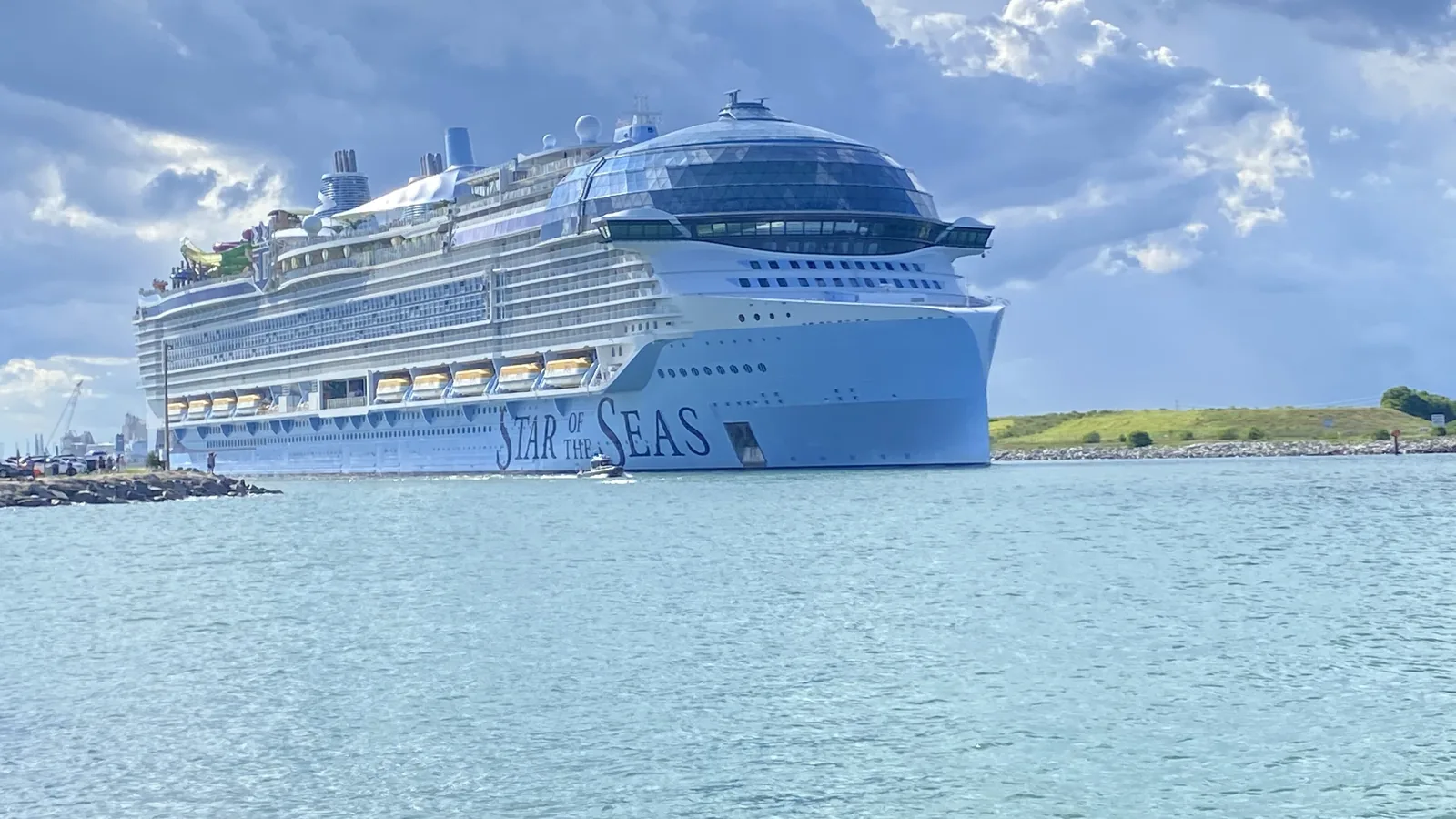 Very large cruise ship with a glass dome sailing out of Port Canaveral, Florida