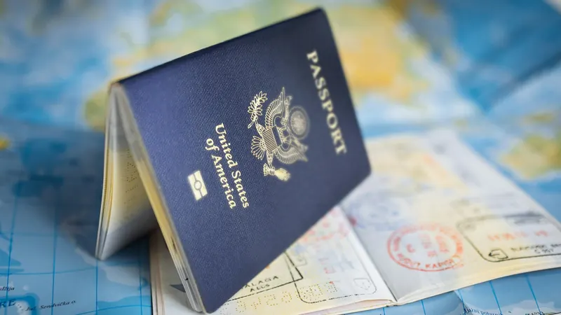 Passport resting open on a colorful world map
