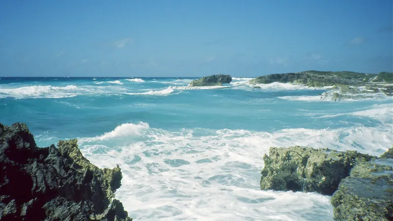 Rocky shoreline and turquoise surf on the east coast of Cozumel